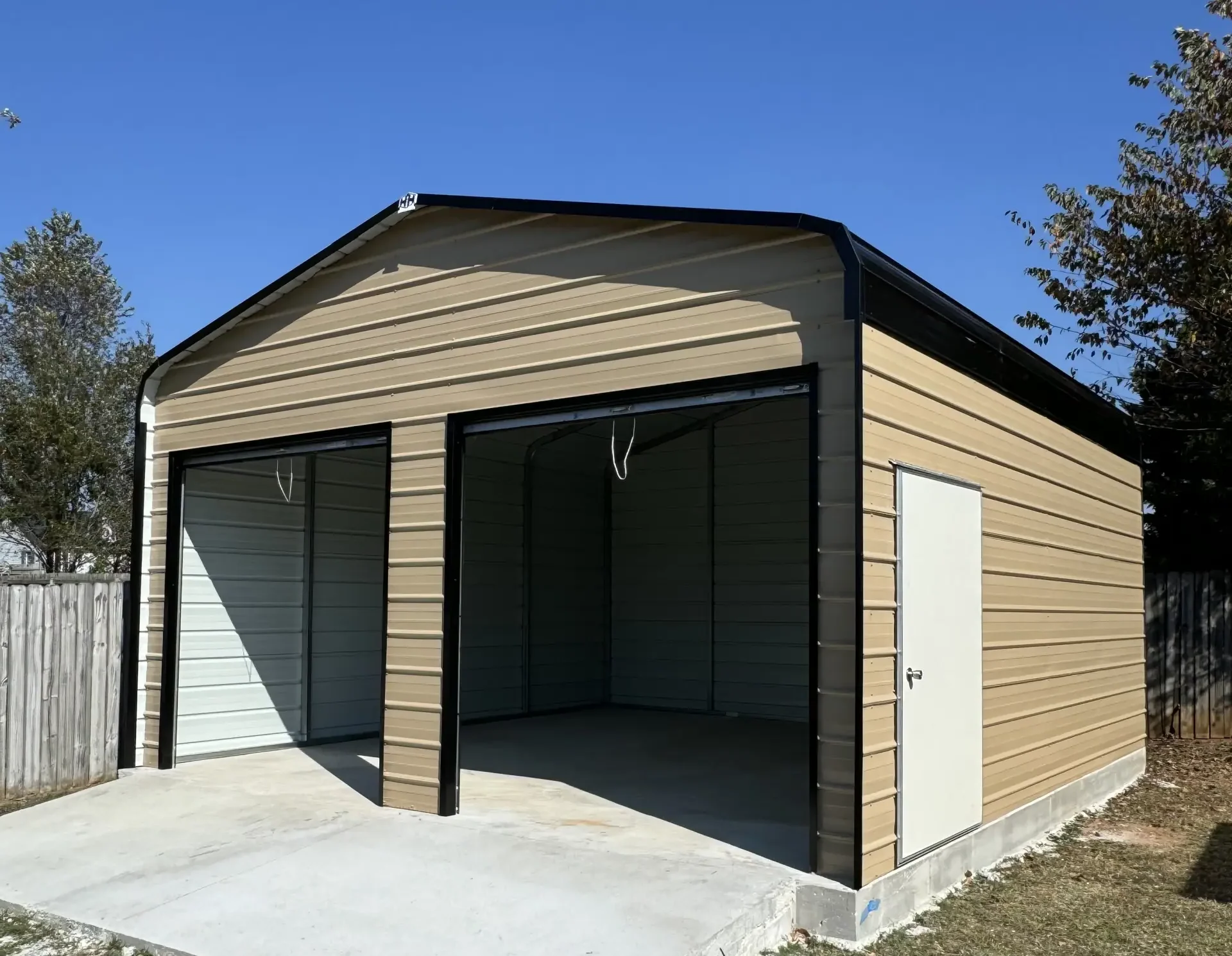 Classic car protected under metal carport