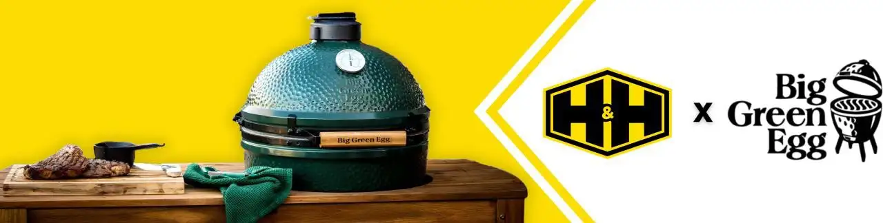 Big Green Egg ceramic grill on outdoor patio